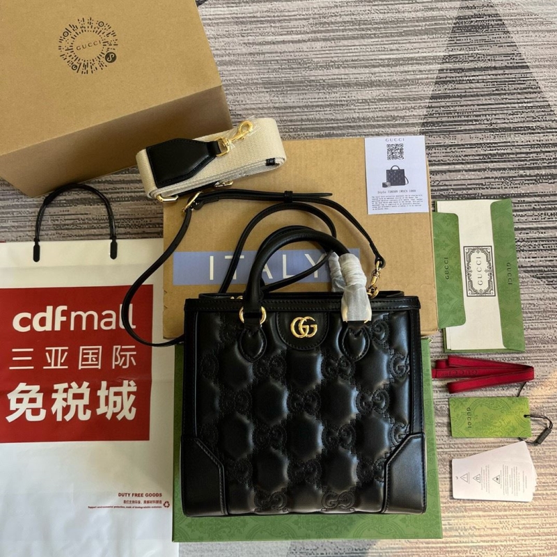 G*u*i top handle bags